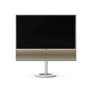 Bang & Olufsen BeoVision Contour 48" 4K OLED teler on koos kõlariga, mida katab puidust ribikate ning toetudes spetsiaalsele jalale saab hoida telerit põrandal