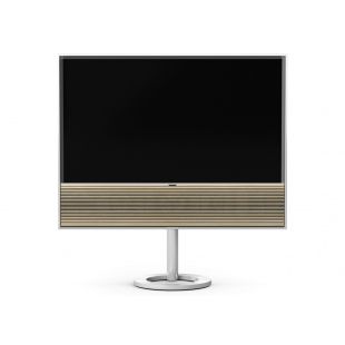 Bang & Olufsen BeoVision Contour 55" 4K OLED teler on koos kõlariga, mida katab puidust ribikate ning toetudes spetsiaalsele jalale saab hoida telerit põrandal